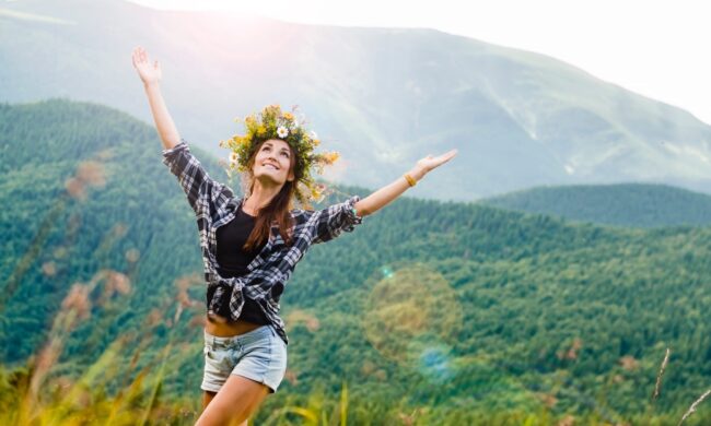 woman dancing in a field