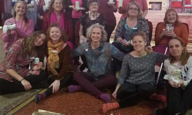 group of women with an ritual altar